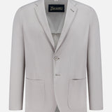 The HERNO Seersucker 2 Button Blazer features a light grey seersucker fabric, notch lapels, two front patch pockets, and a single-breasted two-button design, shown against a plain white background.