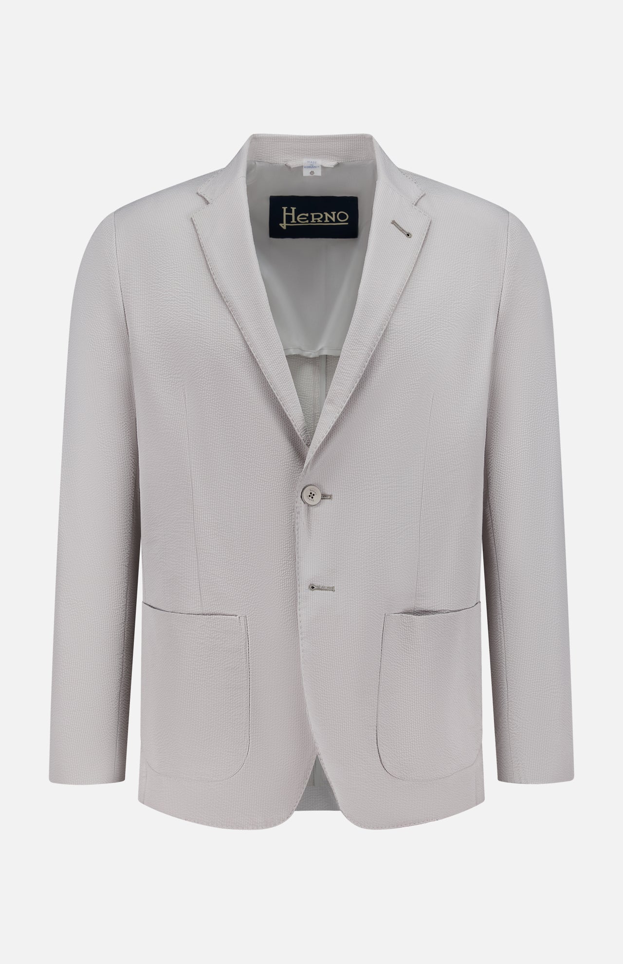 The HERNO Seersucker 2 Button Blazer features a light grey seersucker fabric, notch lapels, two front patch pockets, and a single-breasted two-button design, shown against a plain white background.