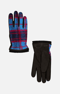 The HESTRA Noah Glove is a men's everyday pair featuring black suede on the palm and a blue, red, and black plaid wool jersey pattern on the back, finished with black trim and visible HESTRA branding.