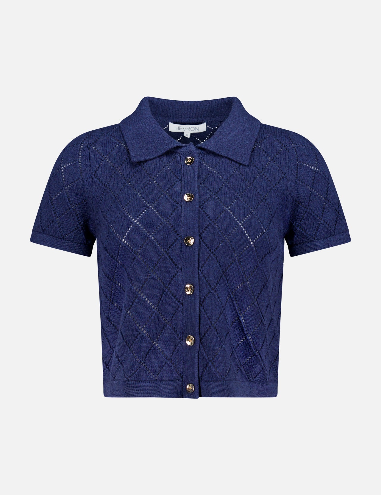 The Arlet Diamond Pointelle Top by HEVRON features short sleeves, a classic collar, gold front buttons, and a navy diamond pointelle knit, shown against a plain white background.