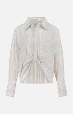 The HEVRON Paola Front Tuck Top showcases white vertical stripes on beige, a collared neckline, adjustable front epaulette, twist detail, and buttoned cuffs. Displayed against a plain white background.