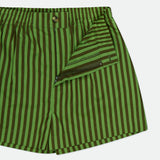 HEVRON Remi Stripe Shorts: Green and dark brown vertical stripes, men's cotton with open front fly, button closure, and visible inner hem stitching. Shown on a white background—ideal for summer style.