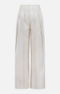 The HEVRON Rory Wide Leg Stripe Pant features a high-waisted beige design with vertical white and light blue pinstripes, front pleats, and side pockets, shown against a white background.