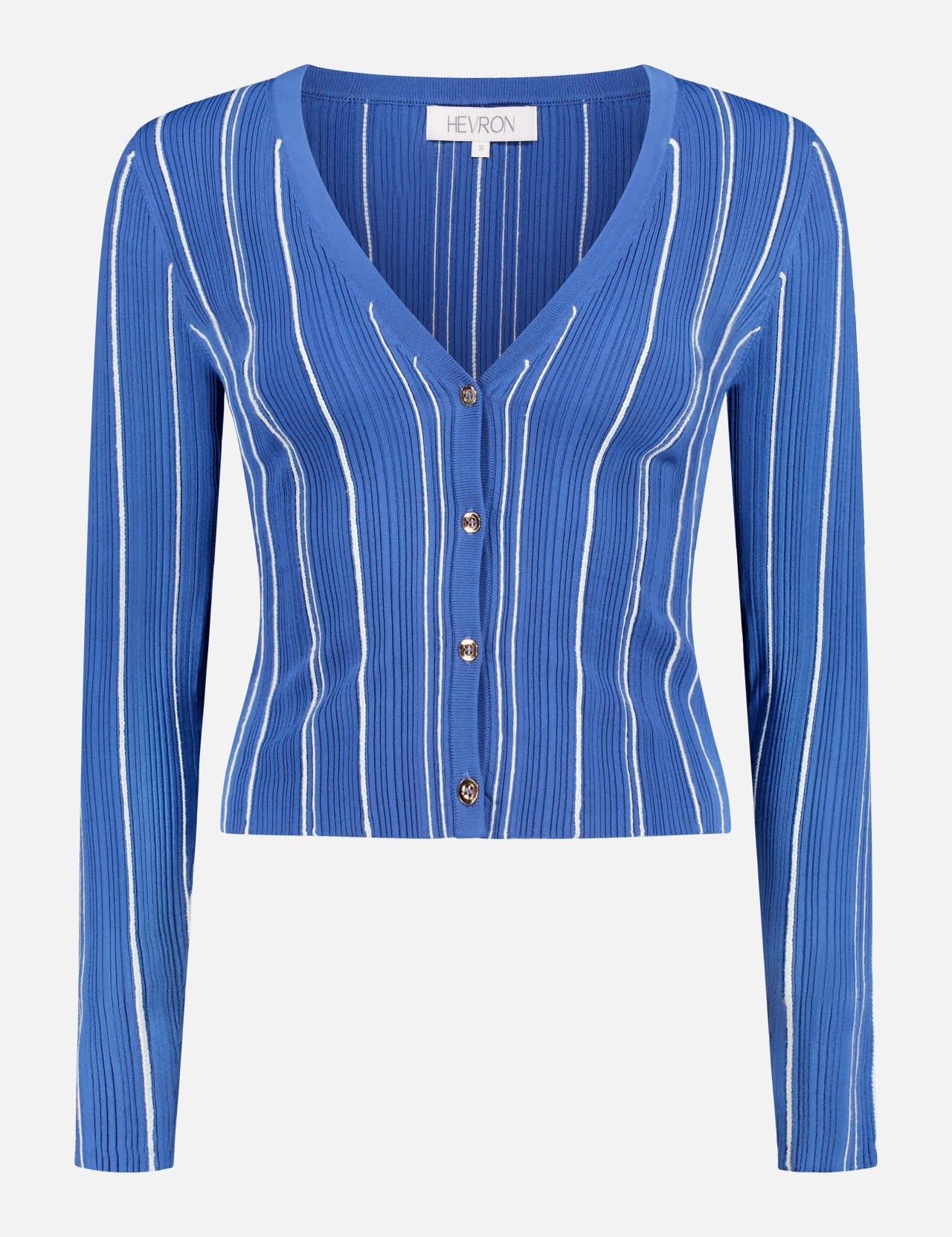 The HEVRON Pearl Stripe Cropped Cardigan is a sapphire, long-sleeve v-neck with white vertical stripes, ribbed texture, and four front buttons. The brand name HEVRON appears on the collar tag.