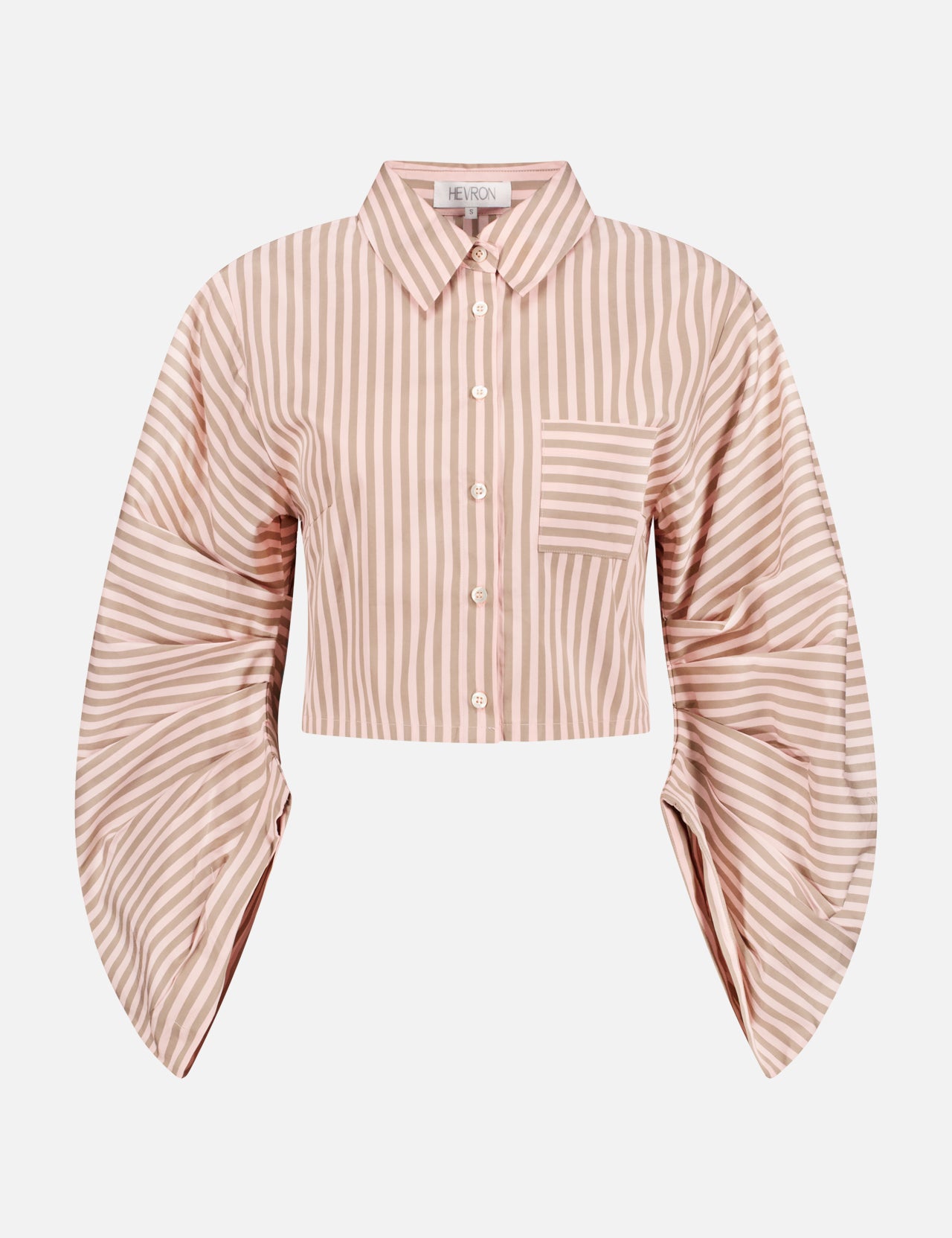 The HEVRON Raquel Striped Gathered Sleeves Top is a cropped cotton blouse with vertical beige and white stripes, a button-down front, left chest pocket, and wide puff sleeves that gather at the wrist for a modern twist.