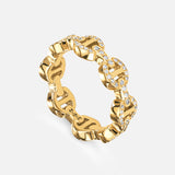 The HOORSENBUHS Dame Tri-Link Antiquated Ring features a yellow gold chain-link design, partially pavé diamond-encrusted, shown against a plain white background.