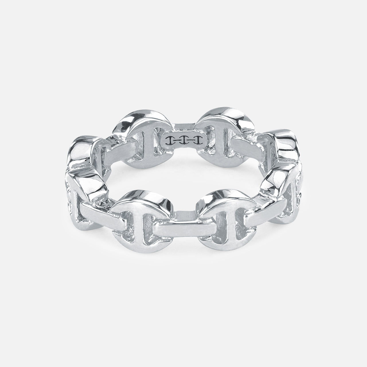The HOORSENBUHS Dame Tri-Link Ring showcases a polished silver interlocking chain design, photographed on a white background—an ideal unisex jewelry piece.