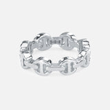The HOORSENBUHS Dame Tri-Link Ring showcases a polished silver interlocking chain design, photographed on a white background—an ideal unisex jewelry piece.