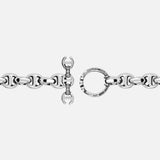 The HOORSENBUHS 10MM Open-Link Bracelet is a unisex sterling silver piece with oval links and engraved details on its round toggle clasp, displayed against a plain white background.