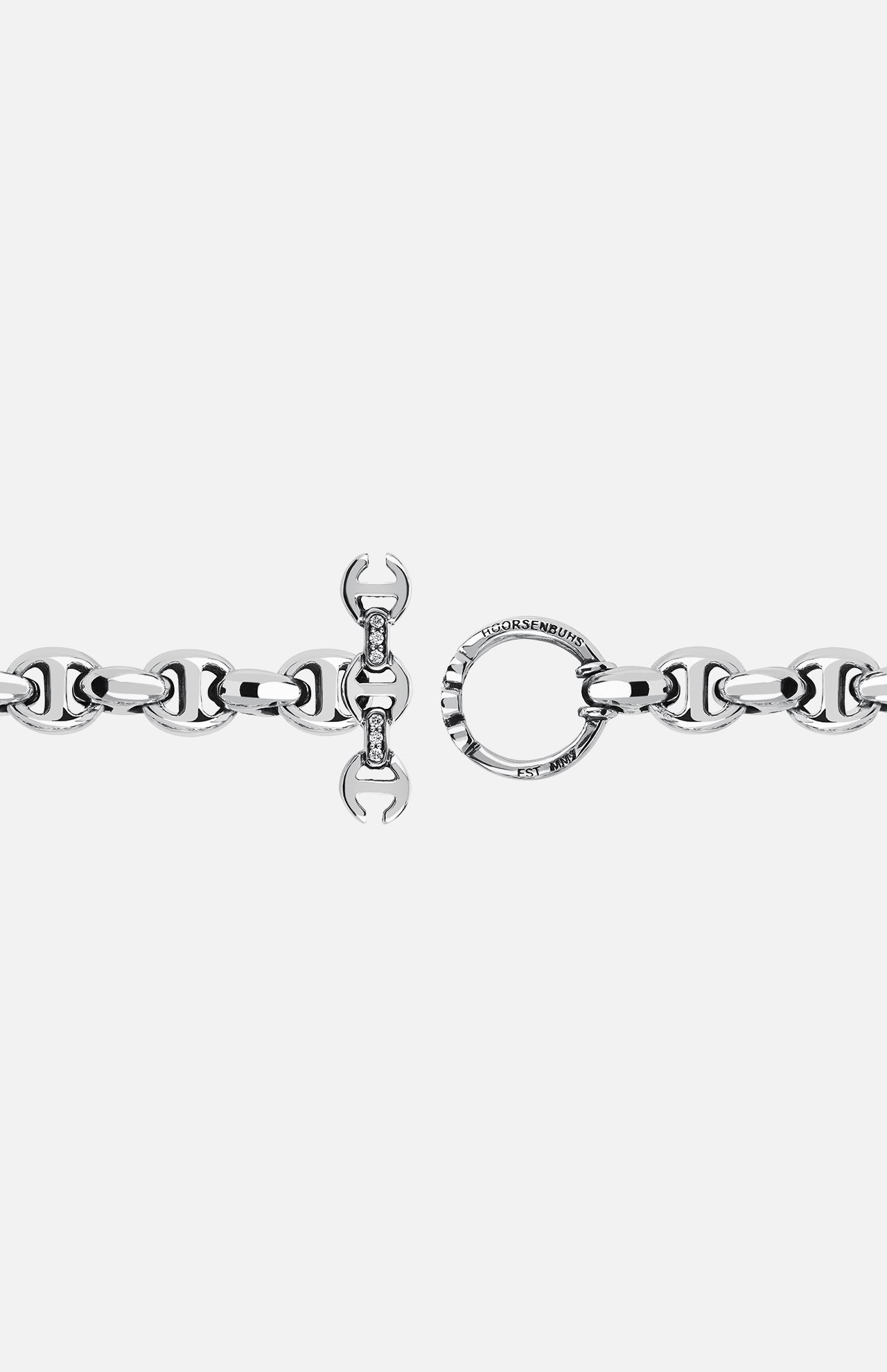 The HOORSENBUHS 10MM Open-Link Bracelet is a unisex sterling silver piece with oval links and engraved details on its round toggle clasp, displayed against a plain white background.