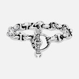 The HOORSENBUHS 10MM Open-Link Bracelet is a chunky sterling silver piece featuring an interlocking circular clasp and small embedded gemstones at the center. Displayed on a plain white background, this unisex bracelet seamlessly blends modern elegance with timeless appeal.