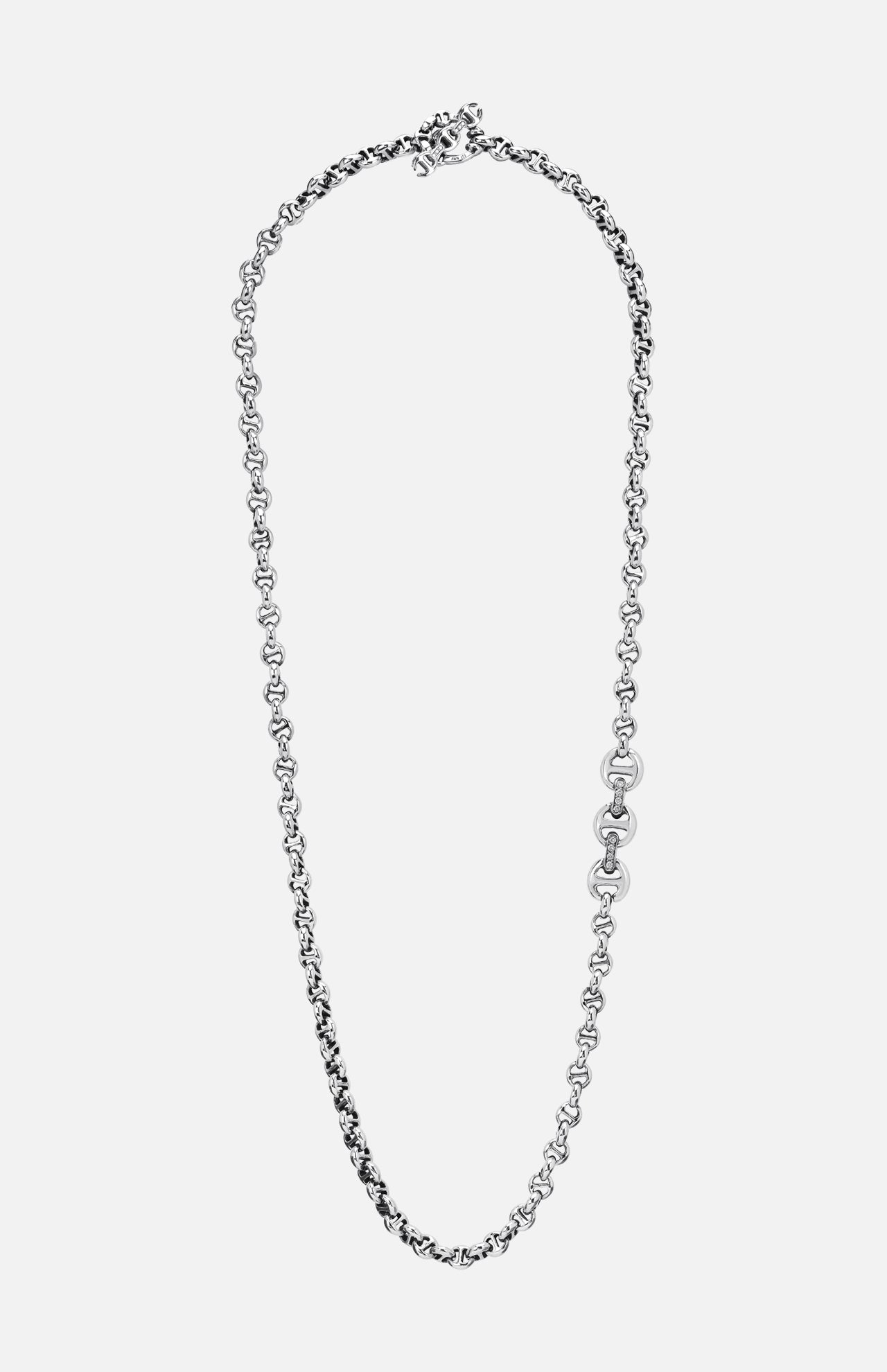 Introducing the HOORSENBUHS 5MM Open Link W/ Diamond Pendant Necklace: an elegant sterling silver piece featuring a mix of small and medium open links. Showcasing a signature tri-link motif and accented with a circular diamond pendant on one side, this necklace is displayed in an oval arrangement against a white background.