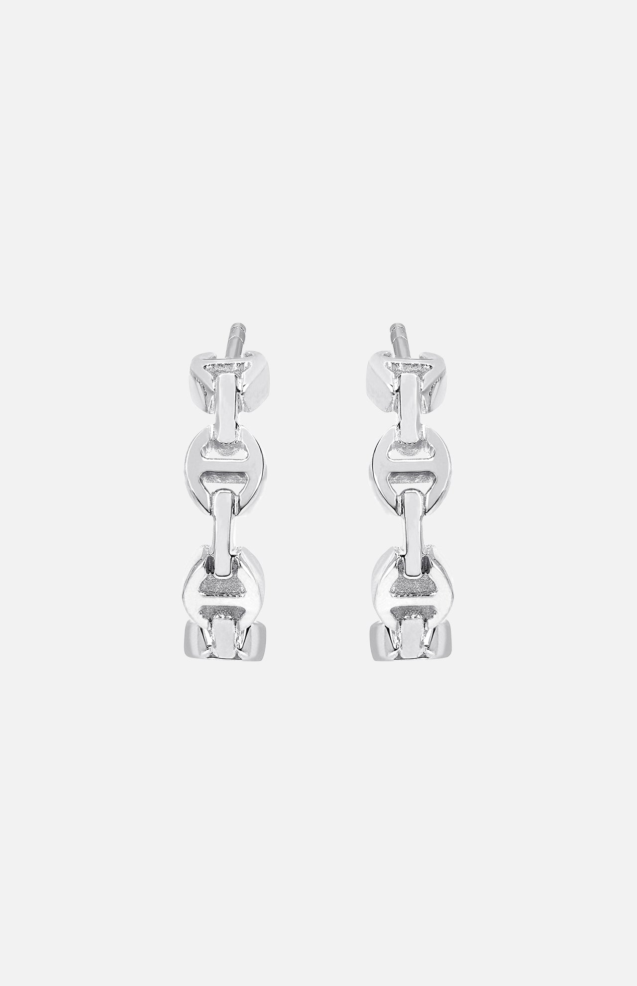 The HOORSENBUHS Micro Crescent Earrings are unisex silver hoops featuring a tri-link chain motif, shown against a plain white background.