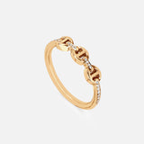 The HOORSENBUHS Micro Makers Eternity Diamond Ring is a yellow gold band with a tri-link design, each link partially set with sparkling diamonds, shown against a plain white background.