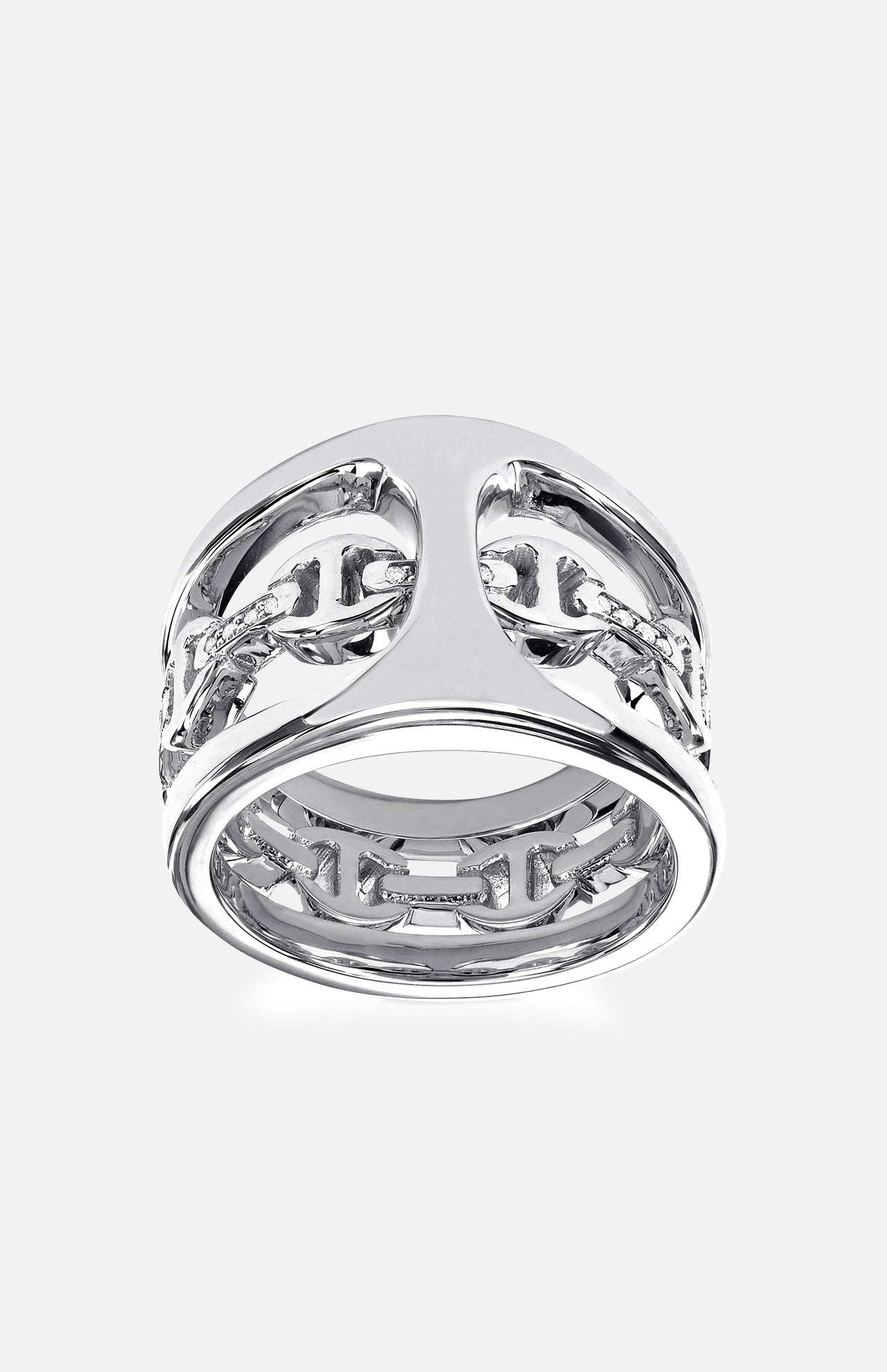 The HOORSENBUHS Phantom Clique Mixed Ring is a wide white gold band with an intricate cut-out design of interlocking shapes and diamond accents, shown against a plain light background.