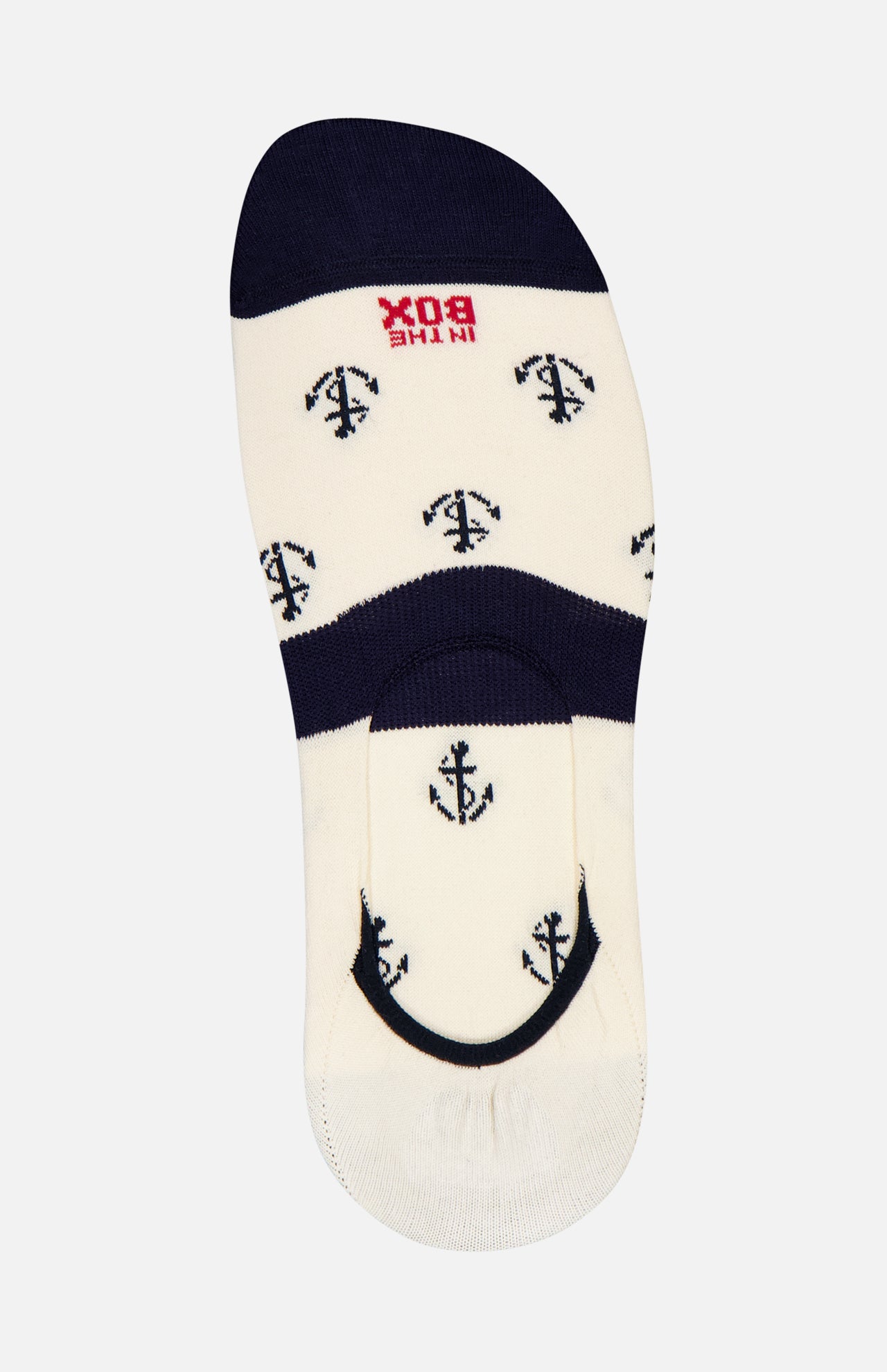 IN THE BOX’s Fantasmini Ancora Allover No Show Socks feature a white base with navy anchor print, navy toe and heel, plus a red logo near the top—crafted in Milan for stylish comfort.