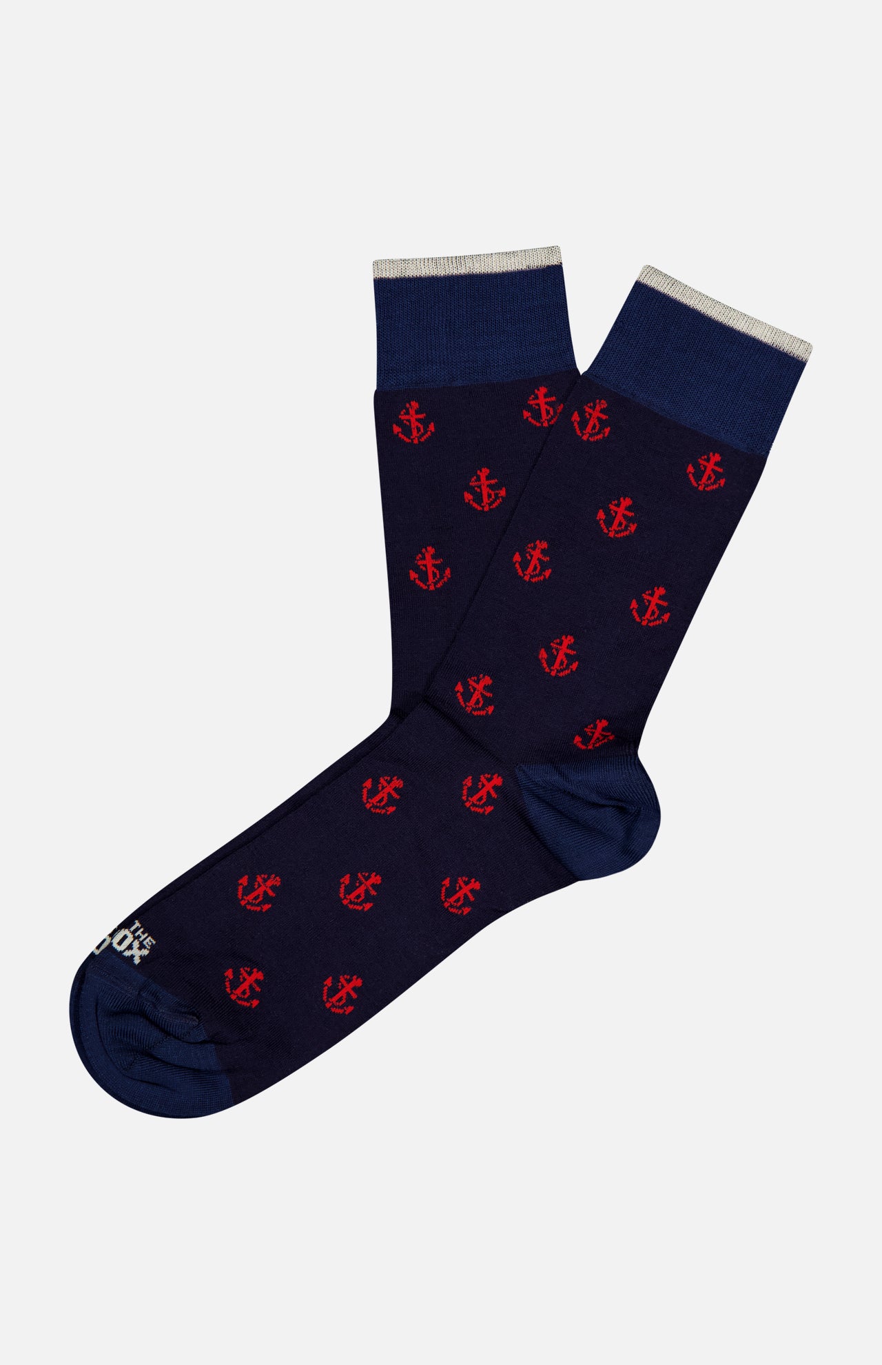 The Ncora All Over Short Socks by IN THE BOX feature a navy base with red anchors and light gray cuffs—perfect nautical socks to enhance any wardrobe.