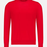 The ISAIA Wool Crewneck Sweater, a pure wool men's knitwear piece in bright red, is shown against a light gray background.