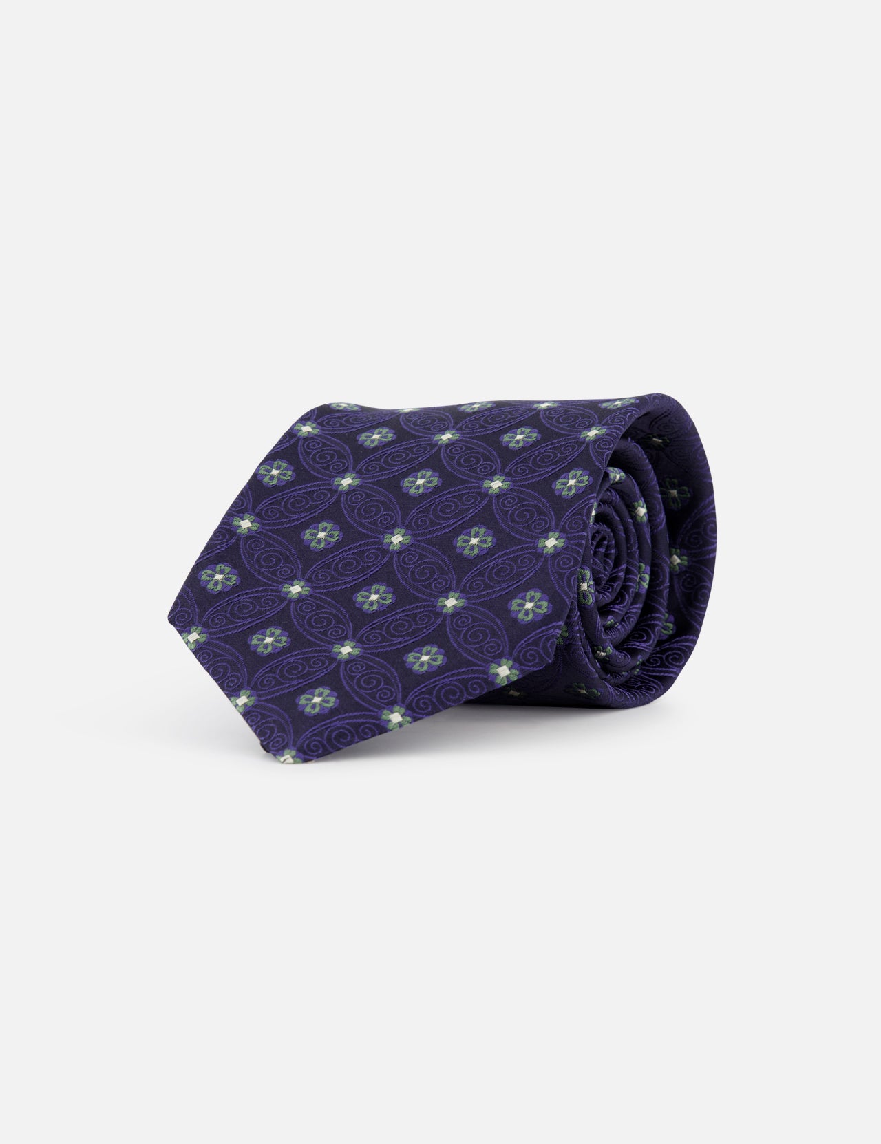 The ISAIA Fantasia Cravatte Decorative Silk Tie features a rolled-up purple design with a light blue and white geometric pattern, displayed on a plain white background.