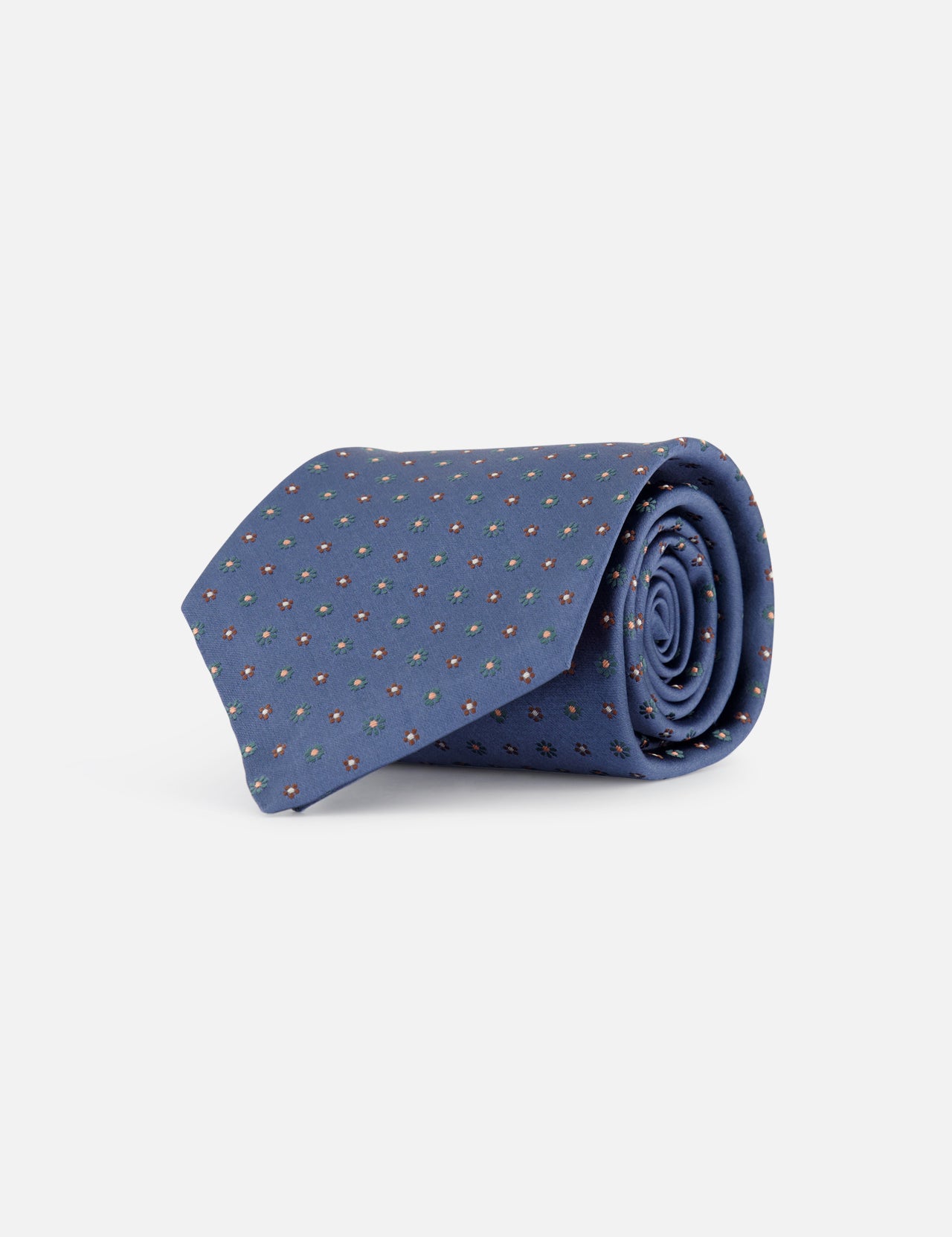 The ISAIA Fantasia Cravatte Silk Floral Tie, featuring a blue base with yellow and red small dotted patterns, is elegantly rolled and displayed on a white background—an ideal choice for wedding attire.