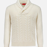 The ISAIA Cashmere Shawl Collar Sweater is a cream-colored, long-sleeve cable knit sweater featuring a cozy shawl collar, ribbed cuffs, and hem. Displayed on a white background, this elegant sweater combines classic style and comfort for any occasion.