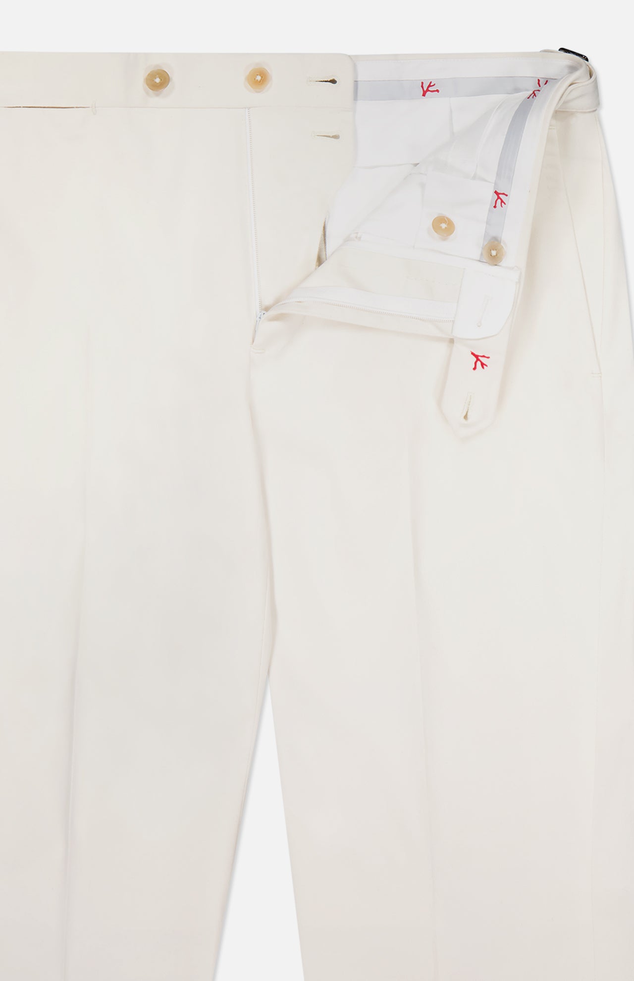The ISAIA Cotton & Cashmere Comfort Trouser Pant features off-white fabric, a partially unbuttoned and unzipped front with visible button and hook closure, white waistband lining with red stitching, and adjustable side tabs for a tailored fit.