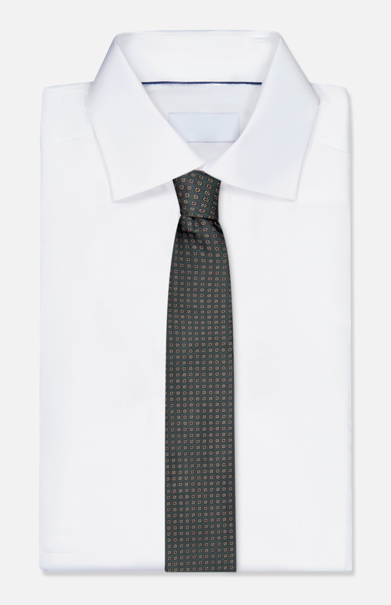 A neatly folded white dress shirt with a pointed collar, paired with the ISAIA Dot Pattern Tie in dark green silk, featuring a subtle dotted design, displayed against a light background.