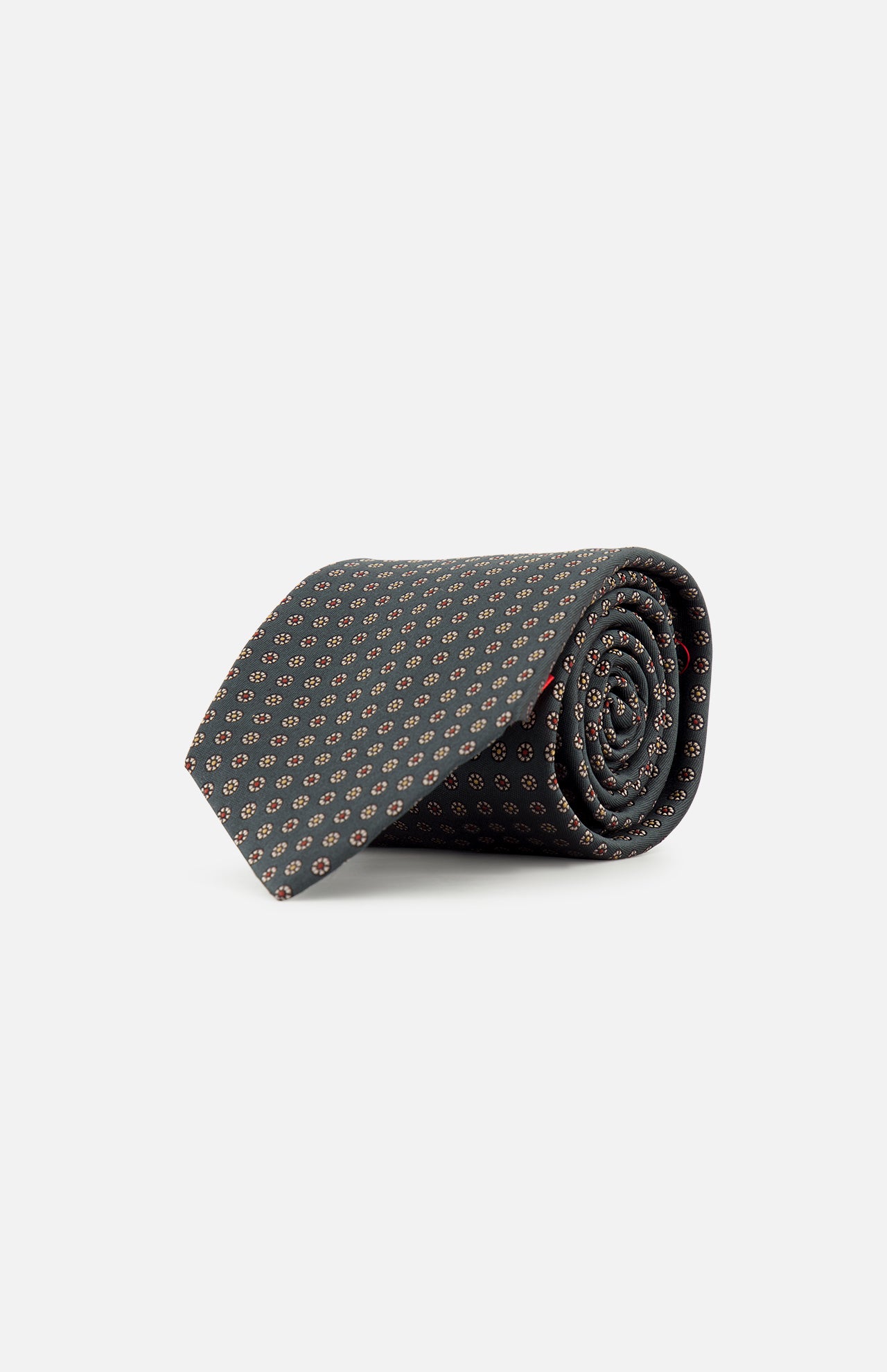 A rolled-up ISAIA Dot Pattern Tie in dark gray silk, featuring a small repeating red and white geometric motif, displayed on a plain white background.