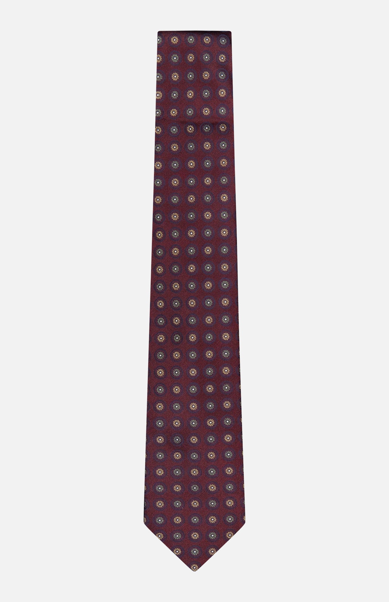 ISAIA Floral Pattern Tie in dark red silk, featuring a maroon base with a repeating small blue and white circular geometric motif, displayed against a plain white background.