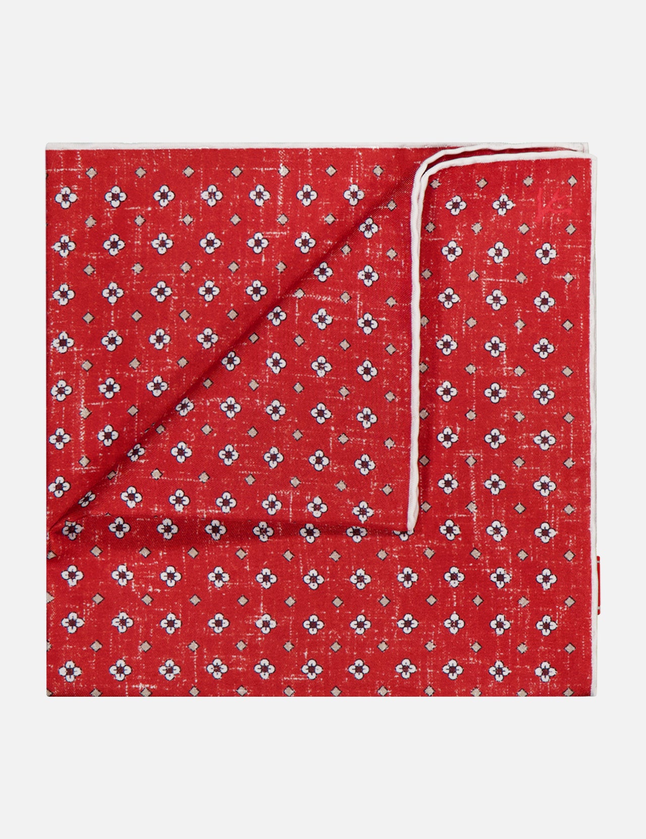 The ISAIA Floral Print Pocket Square, crafted in Italy, showcases a red silk design with a small white and blue floral pattern and displays both its stylish front and the white-edged reverse when folded.