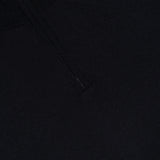 Close-up of the ISAIA Light Cashmere Silk Quarter Zip Sweater in black, crafted from a luxurious blend of cashmere and silk and featuring a partial zipper with a small red fabric detail at the collar.