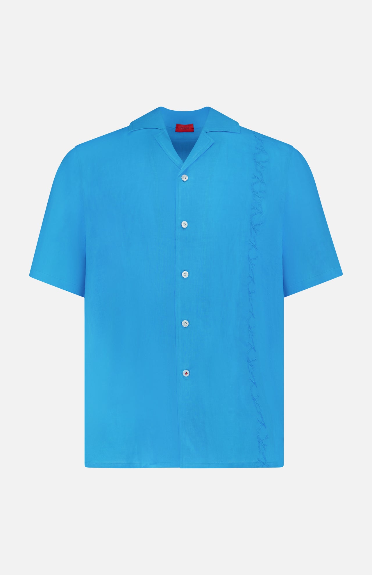 The ISAIA Linen Coral Embroidery Shirt is a relaxed-fit, short-sleeve blue linen button-up, featuring white buttons and a subtle ruffle detail along the right side—ideal for effortless vacation style.