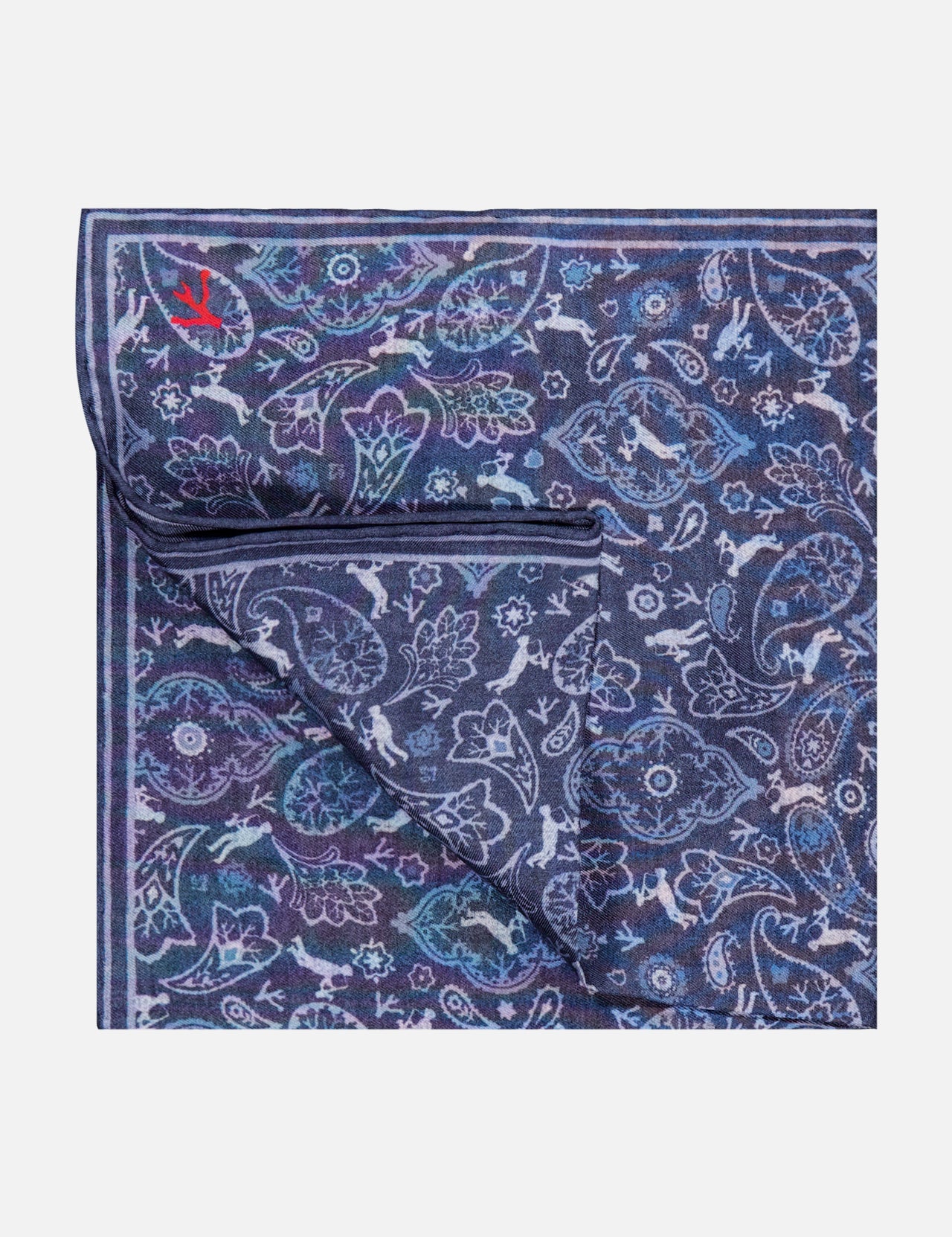 The ISAIA Paisley Pocket Square is a folded navy silk accessory, made in Italy, showcasing a blue, purple, and white paisley pattern with a small red embroidered logo in the corner.