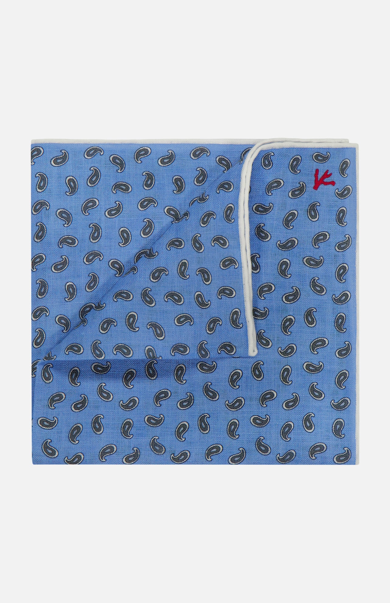 The ISAIA Paisley Print Pocket Square features blue linen with a dark paisley pattern, a white border, and a folded corner that shows the reverse and a small red embroidered detail—ideal for pocket square enthusiasts.
