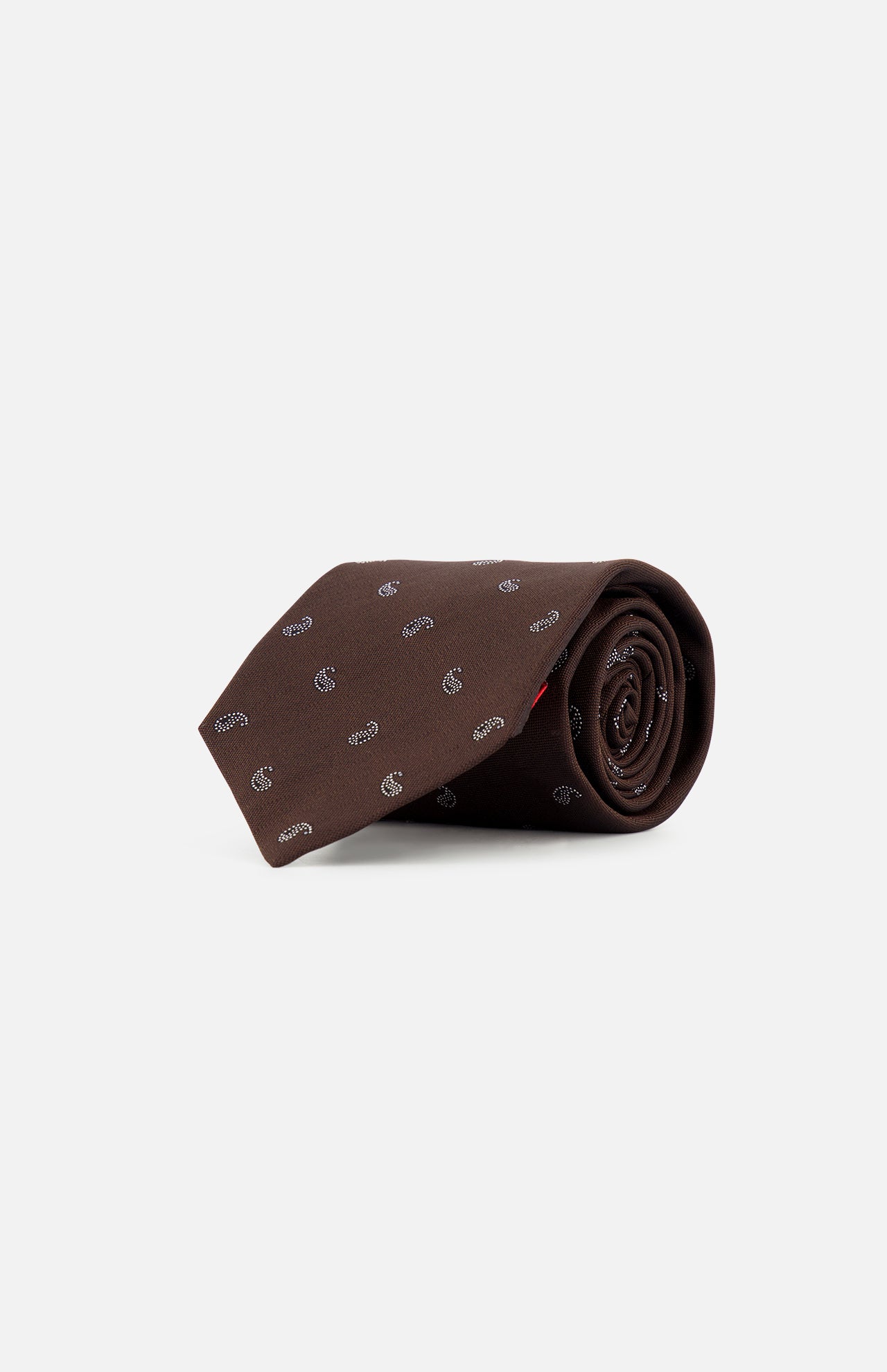 A dark brown Paisley Tie by ISAIA, rolled up and crafted from pure silk, featuring a subtle repeating pattern of small white logos against a plain white background.