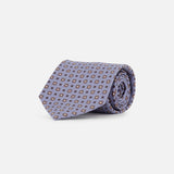 The ISAIA Pattern Neck Tie, crafted in Italy from lavender silk, features a small geometric pattern with white and brown squares and is displayed against a plain white background.