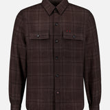 The ISAIA Plaid Knit Effect Overshirt is a brown long-sleeve shirt featuring a button-up front, two chest pockets, and subtle red stitching above the left pocket. Crafted from cashmere with a refined knit-effect plaid pattern, it offers enhanced texture and comfort.