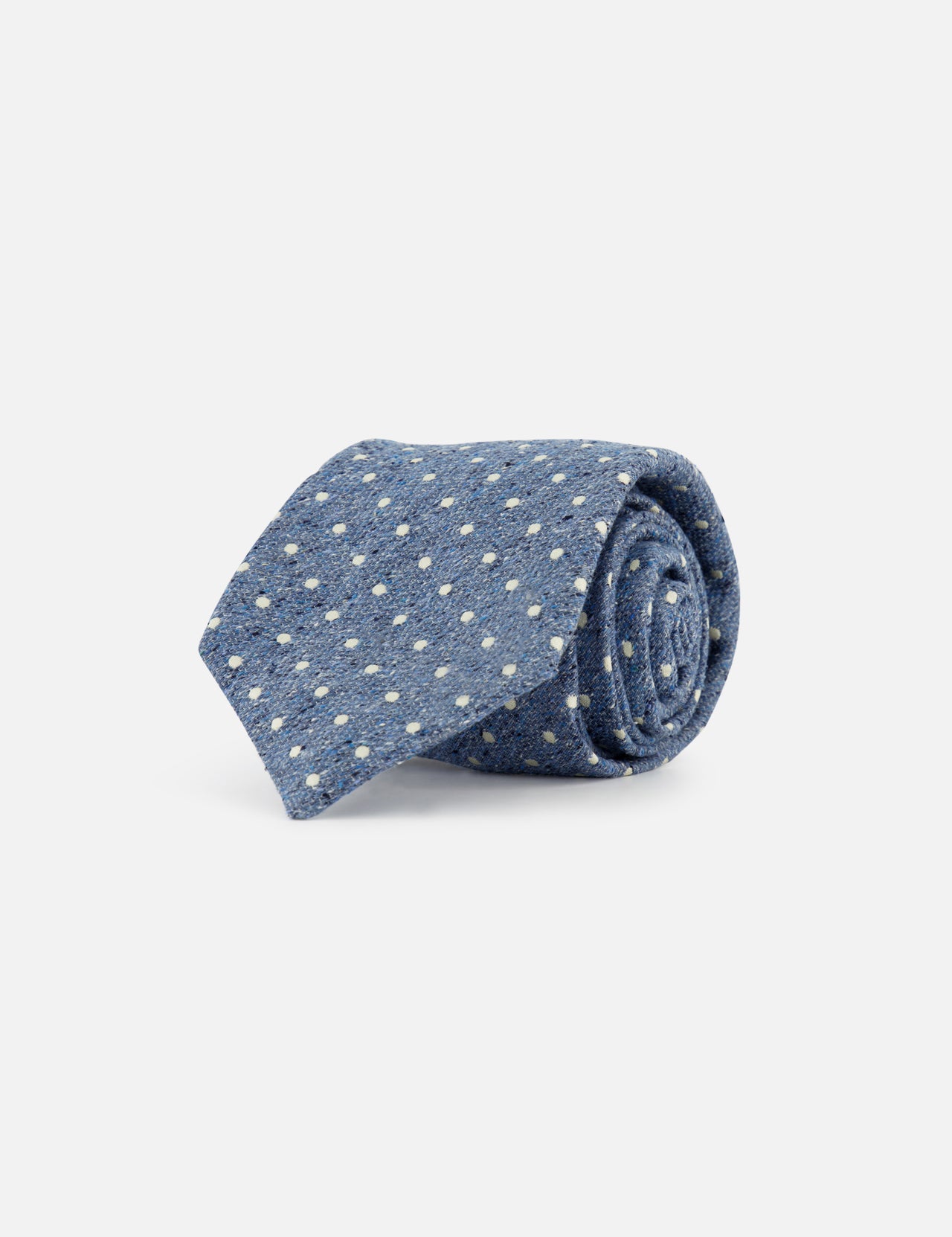 The ISAIA Polka Dot Neck Tie is a rolled-up blue silk tie with white polka dots, shown on a plain white background.