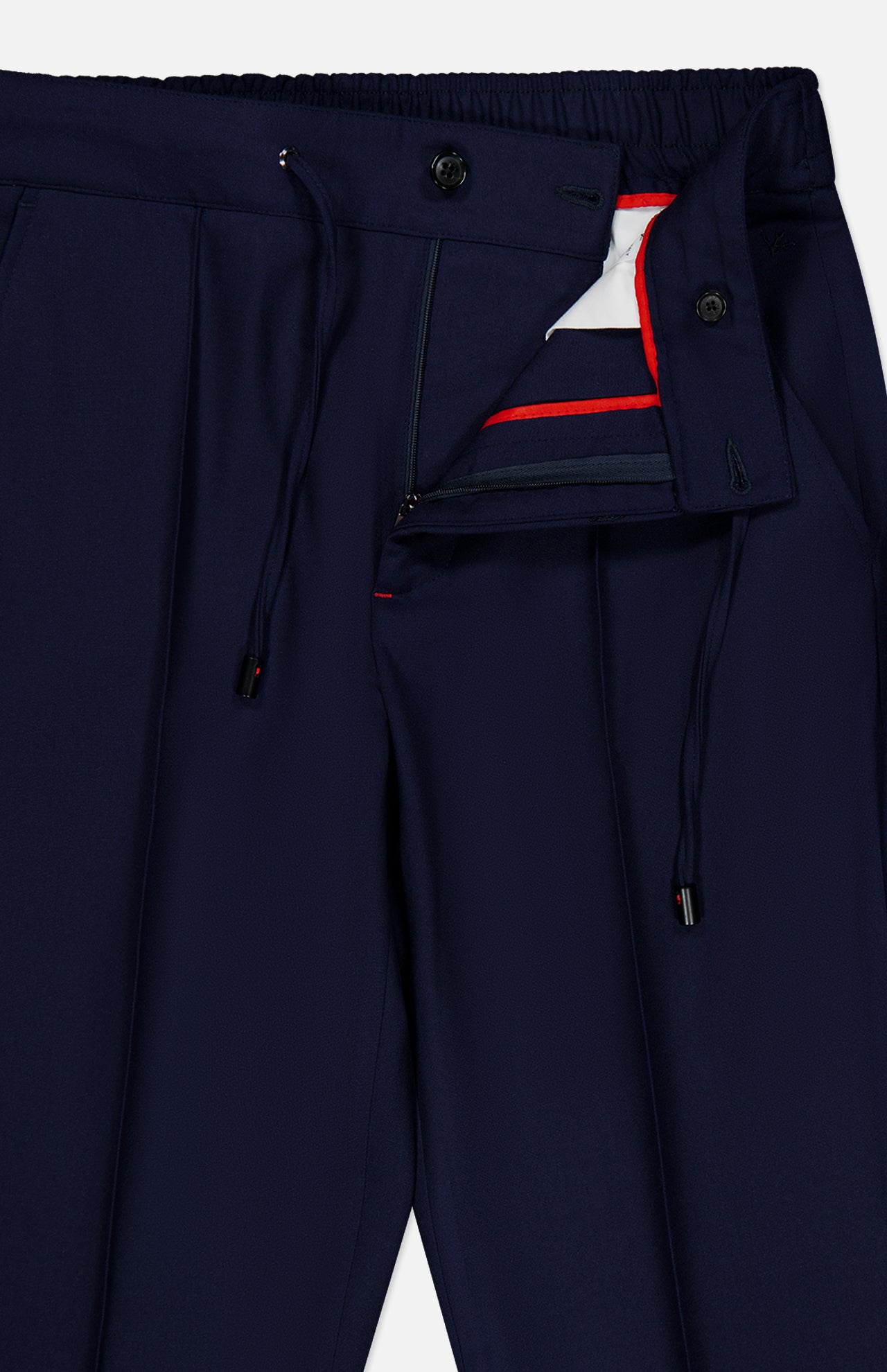The ISAIA Scuba Wool Comfort Suit Trouser is crafted in a navy blue wool-blend and features an elastic waistband with drawstrings, button, and zip fly. The waistband showcases a signature red and white inner trim, while pleats on each leg add tailored sophistication. Expertly made in Italy for outstanding quality and style.