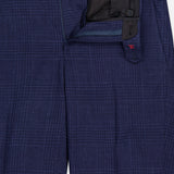 The ISAIA Seersucker Comfort Suit Trouser Pant for men features a blue plaid design with an unbuttoned waistband and partially open zipper, showcasing the inner lining and button details.