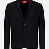 The ISAIA Two Button Knit Sportcoat in black showcases two front pockets, a notched lapel, and a classic two-button closure, presented against a plain white background.