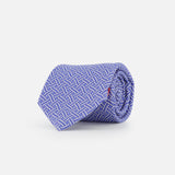 The ISAIA Weave Print Tie is a rolled-up blue necktie with a white geometric pattern, shown against a plain white background.