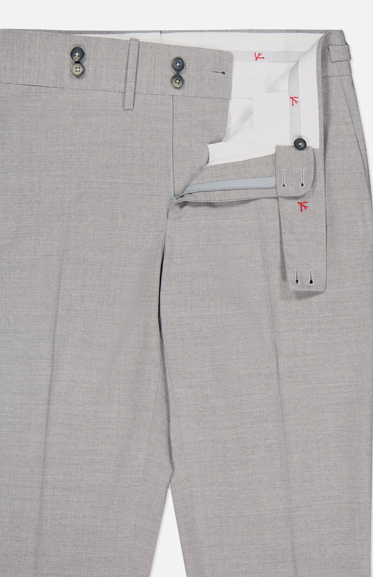 The ISAIA Adjustable Tab Wool Trouser Pant for men features light gray wool, a partially open fly and waistband revealing a white lining with red stitching, button closure, belt loops, side tabs for adjustment, and a tailored formal look.