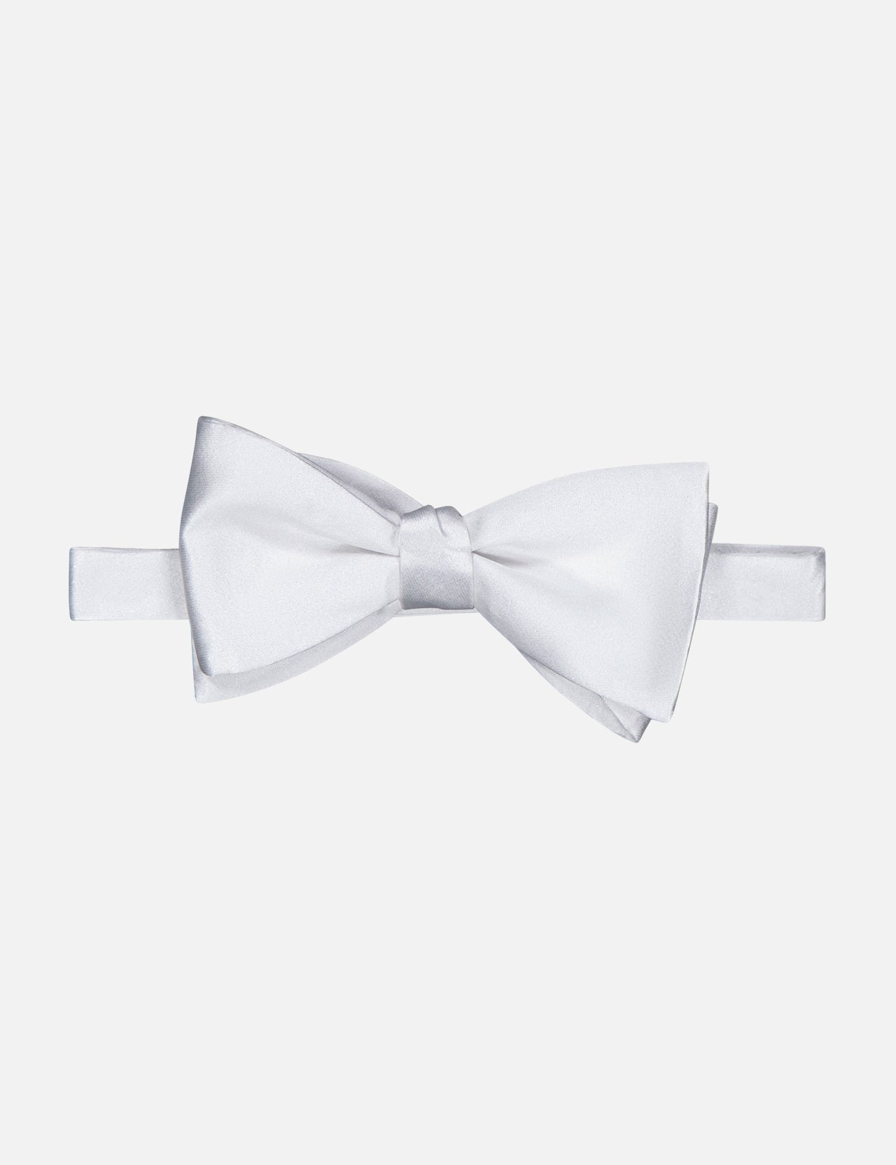The ITALO FERRETTI Self Bowtie is a luxury white Italian silk bowtie with a classic knot, showcased on a plain white background.
