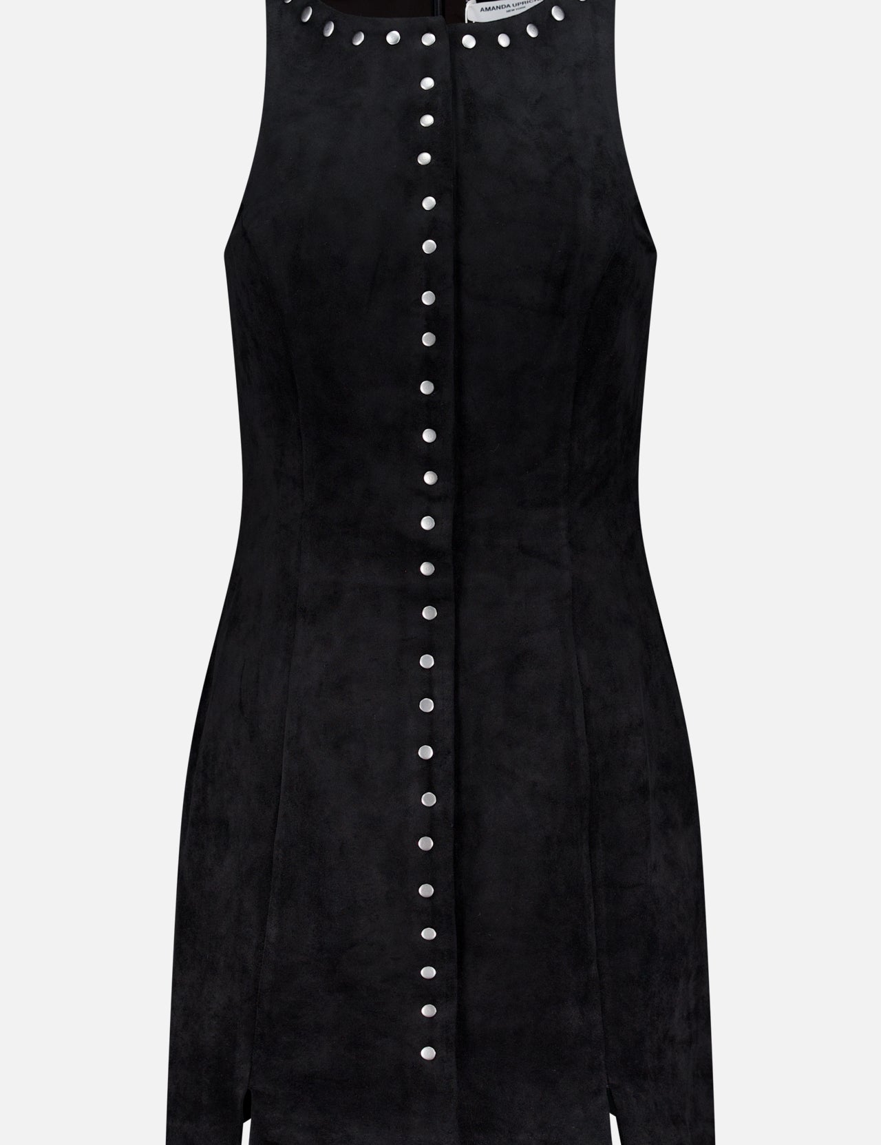 The Oliviera Button Detail Mini Dress by AMANDA UPRICHARD is a sleeveless black suede mini dress with striking buttons, silver studded neckline, fitted silhouette, and front slits near the hem for added style.