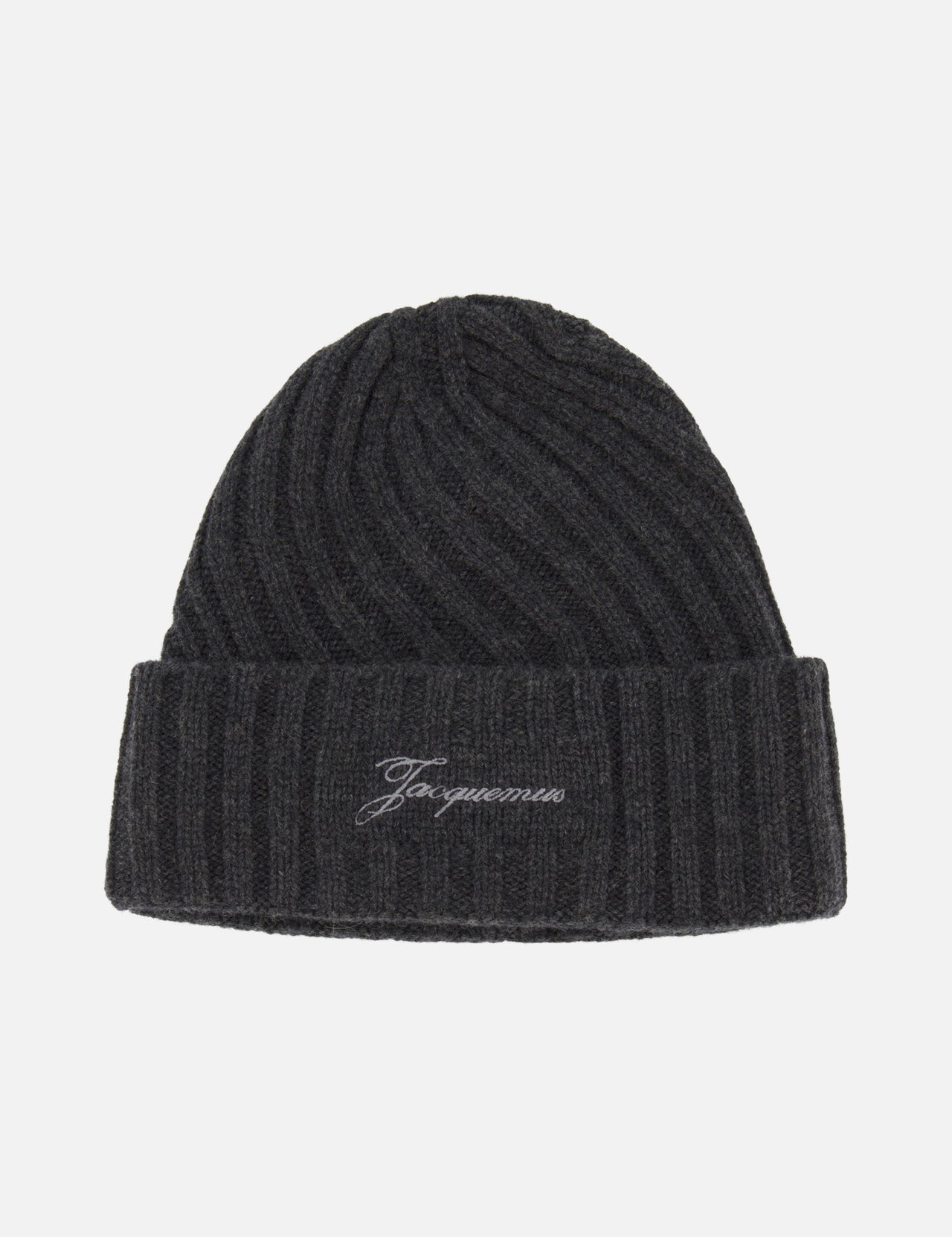 The JACQUEMUS Le Bonnet Tourni Logo Beanie is a dark grey ribbed knit hat with a folded brim, featuring "JACQUEMUS" embroidered in white script on the front—an effortless style statement.