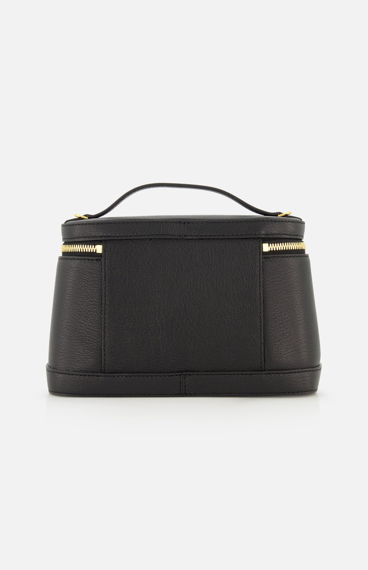 The Le Petit Vanity Bag by JACQUEMUS, crafted from black leather and featuring gold zippers with a sturdy top handle, is elegantly displayed against a white background.