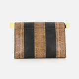 The Le Sac Rond Carre Clutch by JACQUEMUS is a rectangular clutch bag showcasing alternating vertical stripes of brown python-embossed leather and black leather, finished with a gold clasp on the right side, set against a white background.
