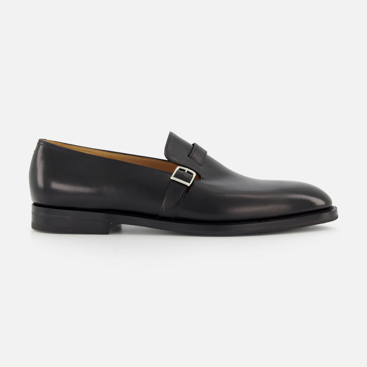 The Delano II Oxford Loafer by JOHN LOBB, shown in side profile against a white background, features black leather and an eye-catching buckle detail in a classic monk strap style.