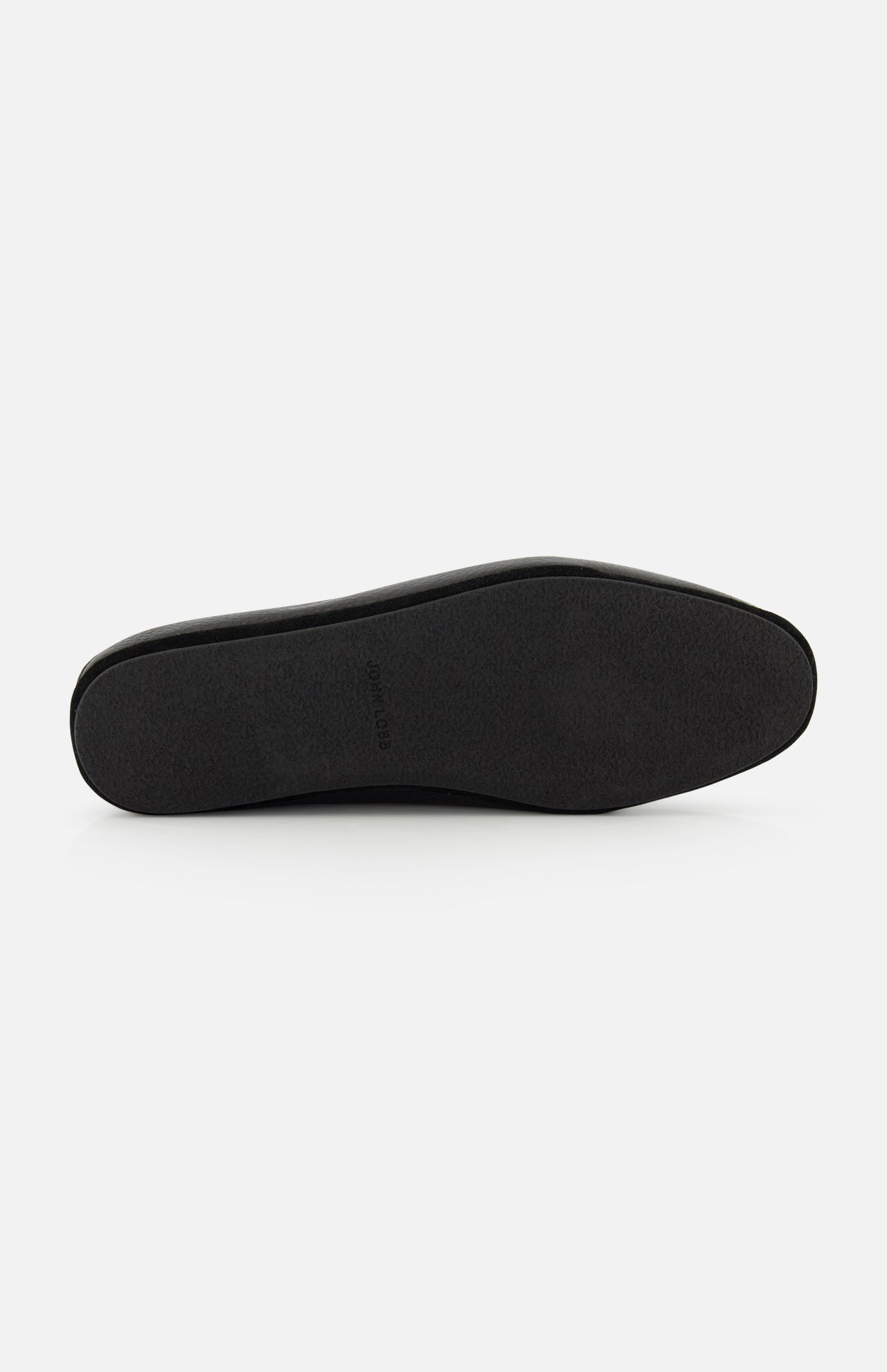 The image shows the sole of a black JOHN LOBB Kingston II Loafer, photographed from the bottom on a plain white background. The flat, smooth sole has no visible tread pattern.